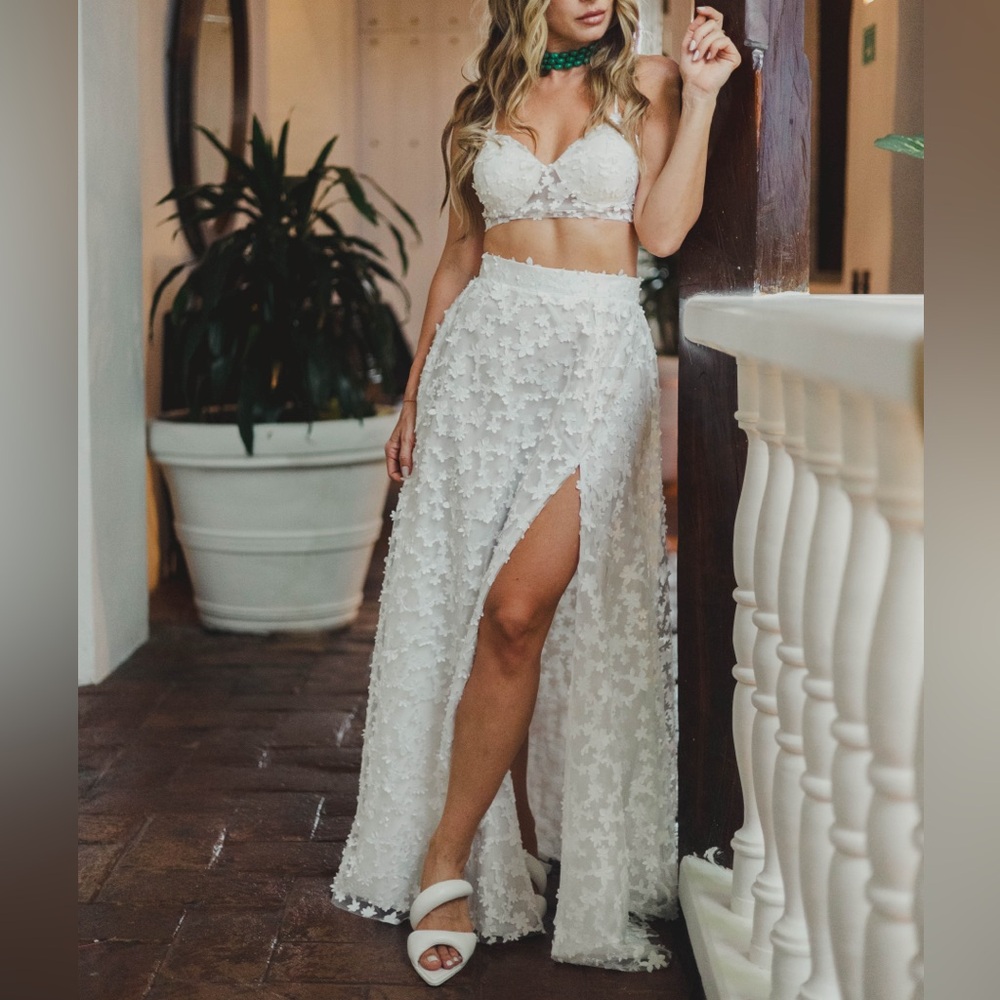 Elegant, unique two-piece design combines timeless charm with a modern twist.